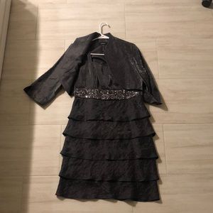 Size 14 grey cocktail dress. Great condition, R&M Richards brand.